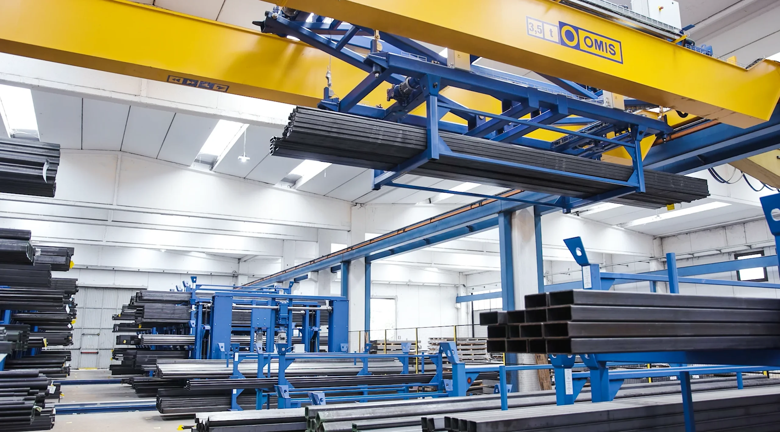 header - Profile automatic overhead crane handling steel bars Omis 