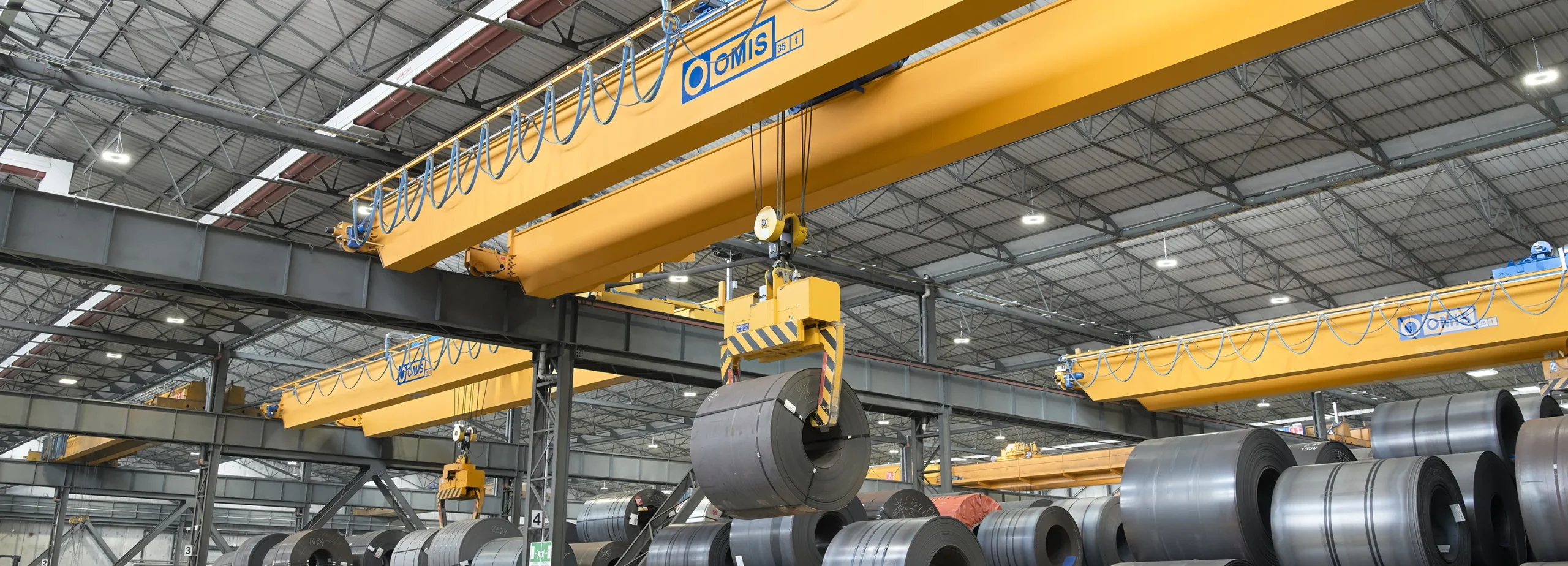 gallery - Cover double-girder overhead crane 35t lifting handling coil sidastico gallery Omis 